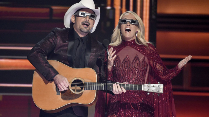 Mandatory Credit: Photo by Invision/AP/REX/Shutterstock (9213026c)
Brad Paisley, Carrie Underwood. Hosts Brad Paisley, left, and Carrie Underwood speak during the 51st annual CMA Awards at the Bridgestone Arena, in Nashville, Tenn
APTOPIX 51st Annual CMA Awards - Show, Nashville, USA - 08 Nov 2017